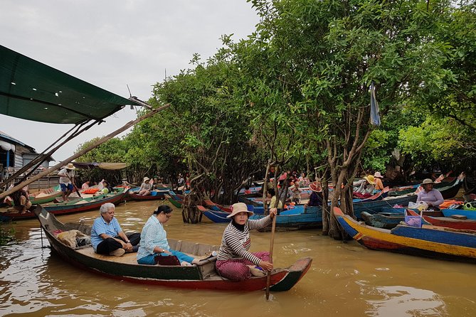 1day private tour all main temple in Angkor,sunset at TonleSap floating village - Passing through Angkor Thom and its carved gates