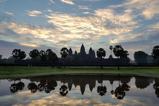 1day private tour to all majestic Temples in Angkor and Sunset - Ta Prohm brings the jungle into the ruins