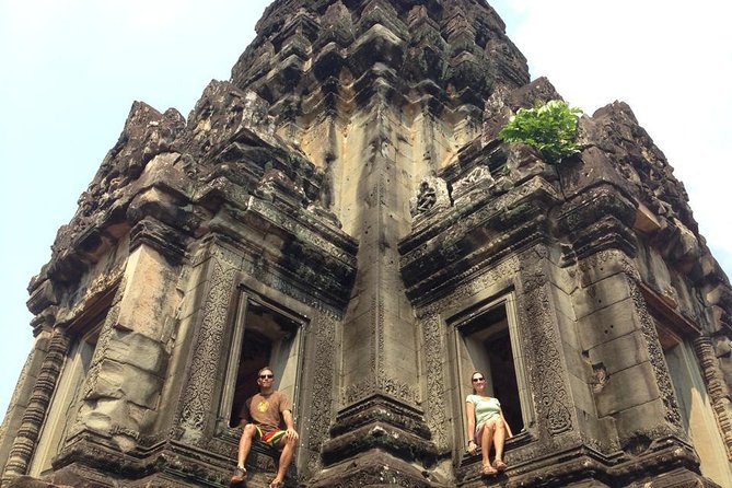 2-D Angkor temple tour with one sunrise in A/C vehicle and guide. - The Guide Can Shape the Whole Experience
