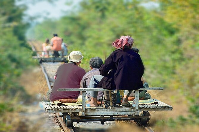 Afternoon tour to Original Bamboo train. Bat cave. Killing cave - Villages, farms, pagodas, and a suspension bridge