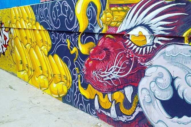 An Afternoon of Contemporary Art in Phnom Penh by Tuk Tuk - A garden drink and a photo exhibition