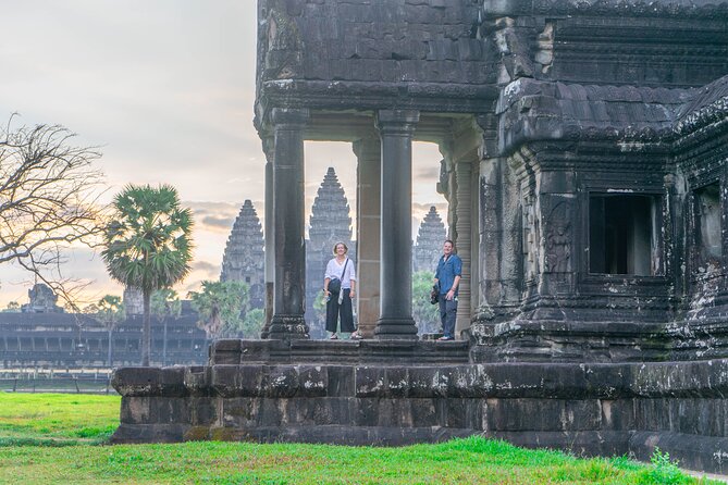 Angkor Adventure Vespa Tour / Tuk Tuk or Car - Angkor Thom and Bayon: faces, carvings, and a wider look at the park