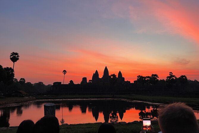 Angkor Sunrise Bike Tour with Lunch Included - Angkor Wat: grand scale before the heat