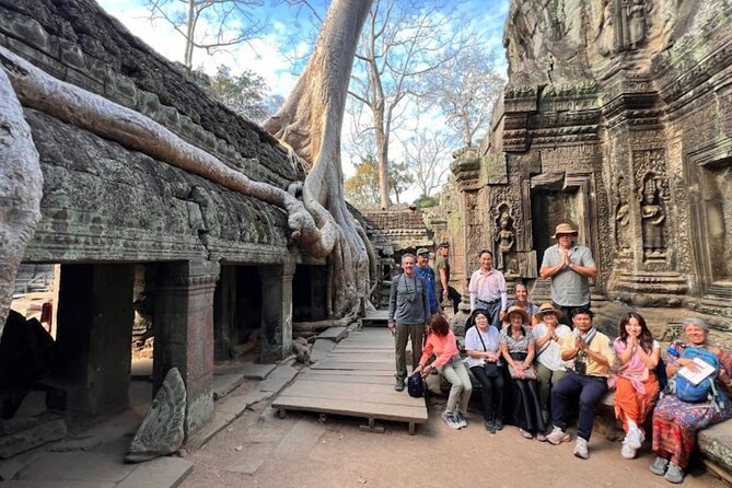 Angkor Sunrise Half-Day Tour with Private Vehicles & Tour Guide - Ta Prohm, where trees meet the temple walls