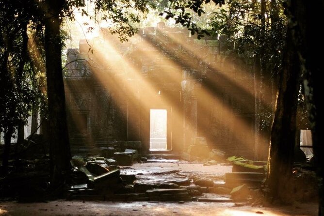 Angkor Sunrise Half-Day Tour with Private Vehicles & Tour Guide - Bayon Temple and its famous stone faces