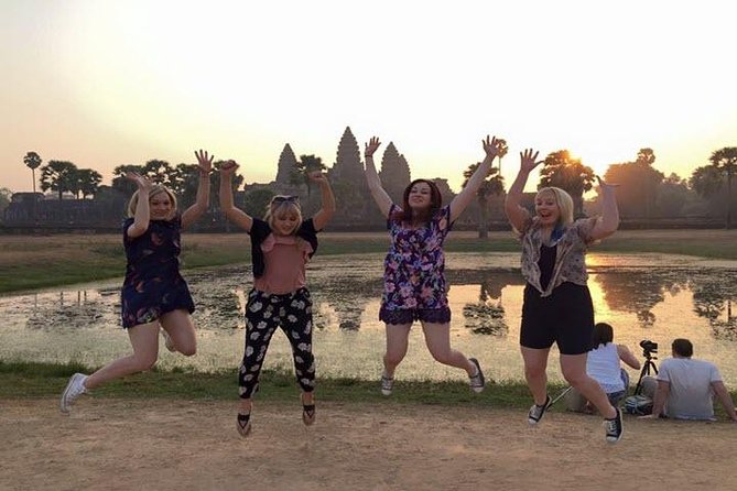 Angkor Wat highlight Tour From Sunrise -Small Group - Angkor Thom South Gate and the stone faces of Bayon