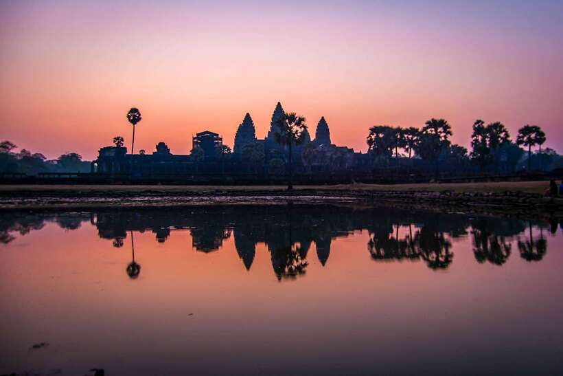 Angkor Wat: Highlights and Sunrise Guided Tour - Angkor Wat sunrise from the reflection pools
