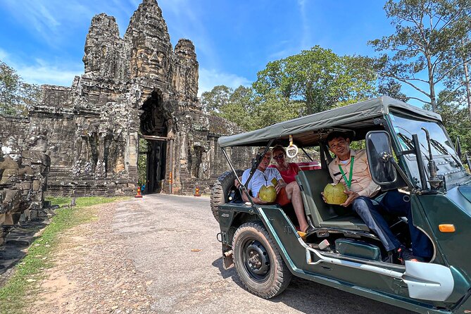 Angkor Wat Sunrise and Market Tour by Jeep - Ta Prohm, where forest meets stone