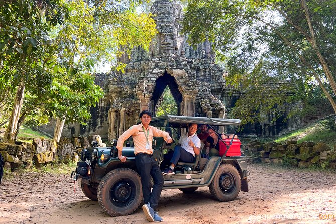 Angkor Wat Sunrise and Market Tour by Jeep - Angkor Thom: a two-hour finale of major monuments