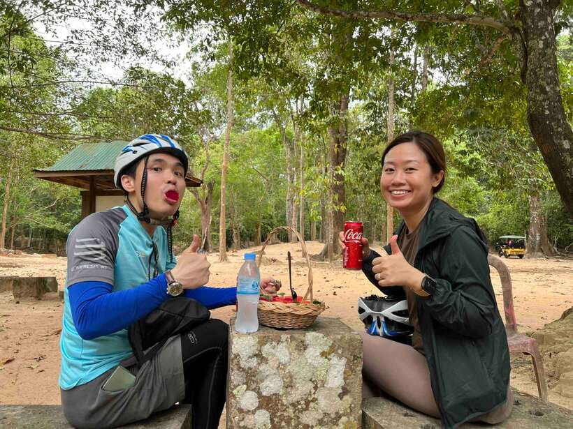 Angkor Wat Sunrise Bike Tour With Lunch Included - Cycling through Angkor Thom at 8:00 am