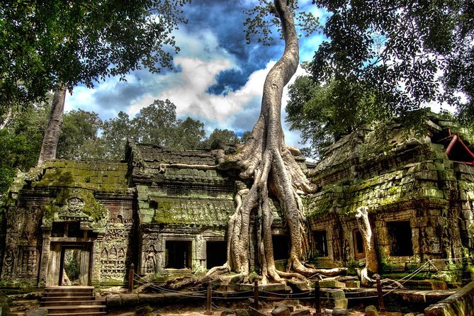 Angkor Wat: Sunrise or Sunset Tours with Tuk Tuk - Bayon Temple: carved faces and scenes of daily life