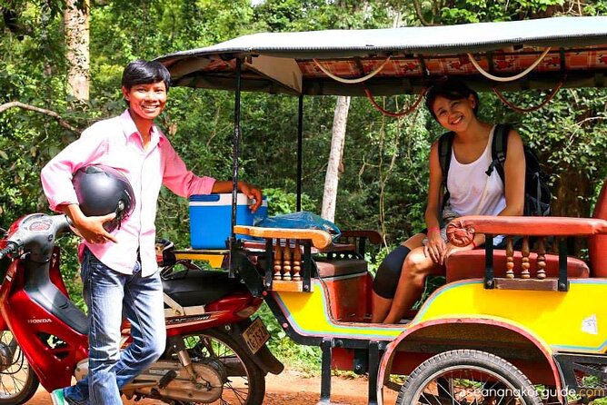 Angkor Wat Sunrise Private Tour via Tuk Tuk from Siem Reap - Bayon’s smiling stone faces