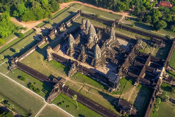 Angkor Wat Sunset Tour - Ta Prohm trades open stone for jungle drama