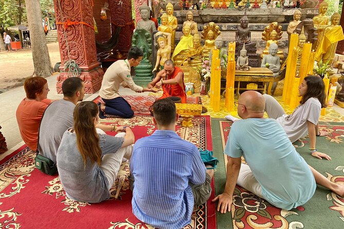 Buddhist Monastery with Monks Water Blessing - Why this monastery visit feels different from temple sightseeing