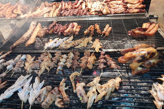 Evening Cambodian Food Tour - Trying insects, spiders, and bugs near Chaktomuk