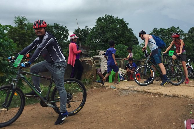 Explore local livelihood & countryside (Half-Day Cycling Tour) - Seeing the large Buddha statue and local worship