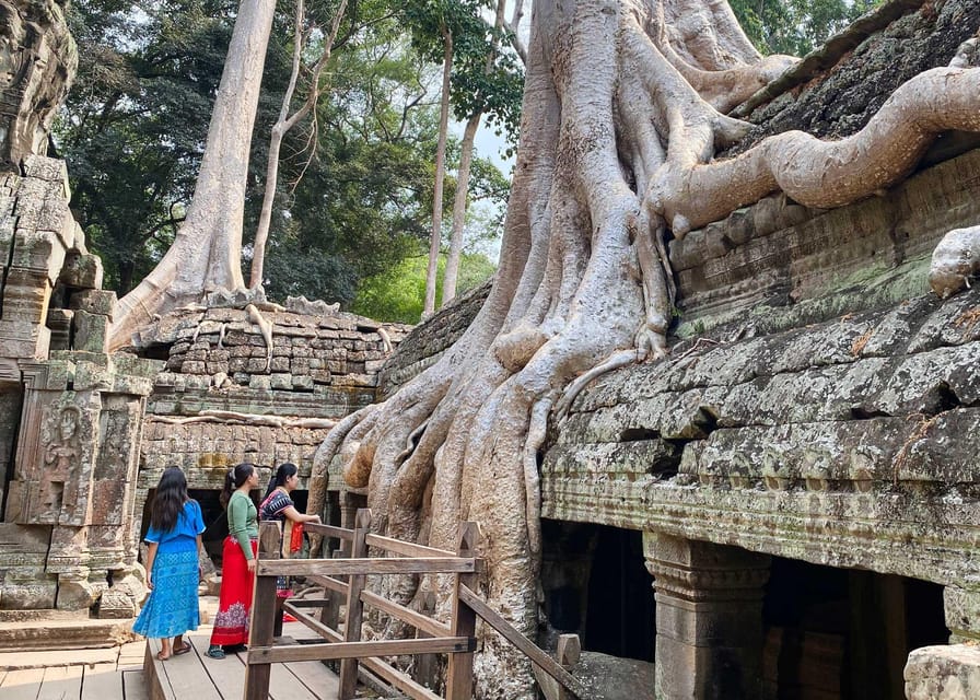 From Phnom Penh: Angkor Wat, Bayon, and Ta Prohm Day Trip - Ta Prohm, where the jungle takes the temple back