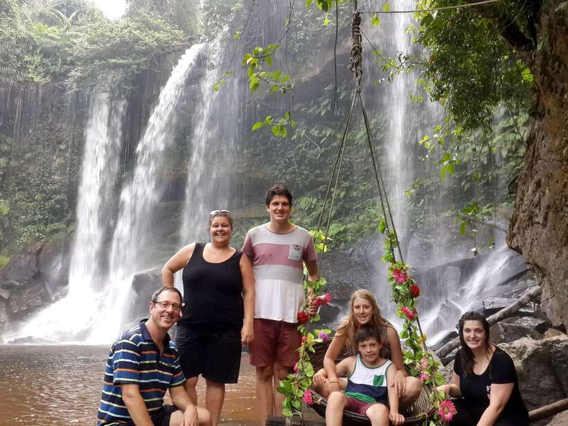 From Siem Reap: Small-Group Phnom Kulen Waterfall Day Tour - Cooling off at the Phnom Kulen waterfall