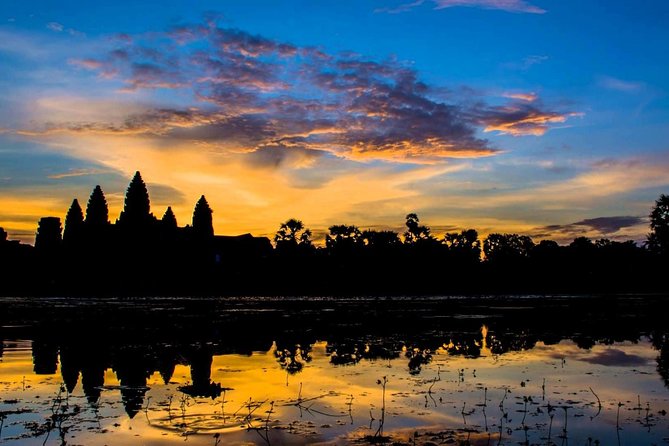 Full-Day Angkor Wat Sunrise Private Tour with Guide from Siem Reap - Angkor Wat from first light through the galleries