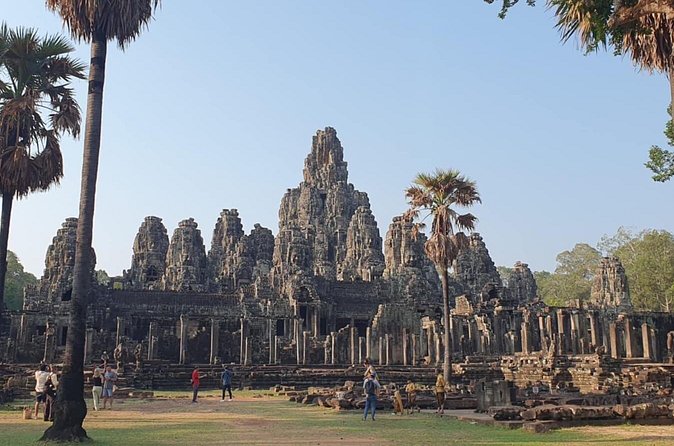 Full Day Angkor Wat Temples Tour with Pickup - Ta Prohm, Where Nature Takes Over