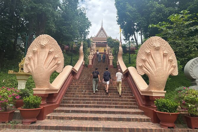 Half Day Tour to Royal Palace, Wat Phnom & Independent Monument - Guide quality can make or break the day