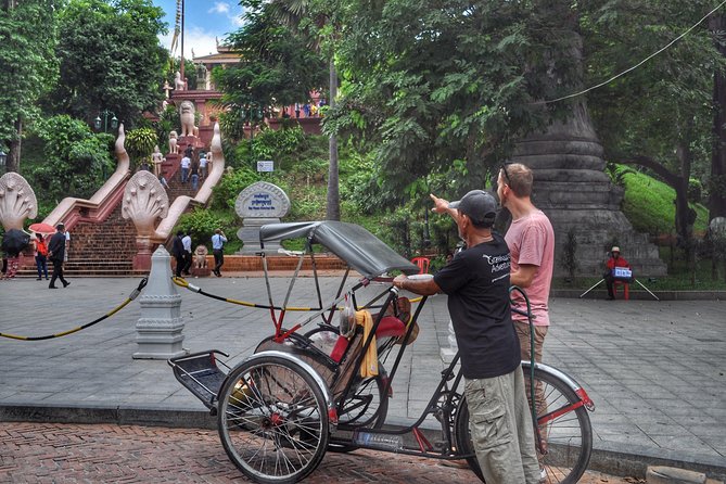 Hidden Phnom Penh City Tour, Royal Palace, Wat Phnom - One hour through markets, stalls, coffee, and side streets