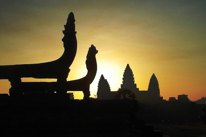 One Day tour with sunrise in car with A/C or Van & Guide. - Bayon and the stone faces of Angkor Thom