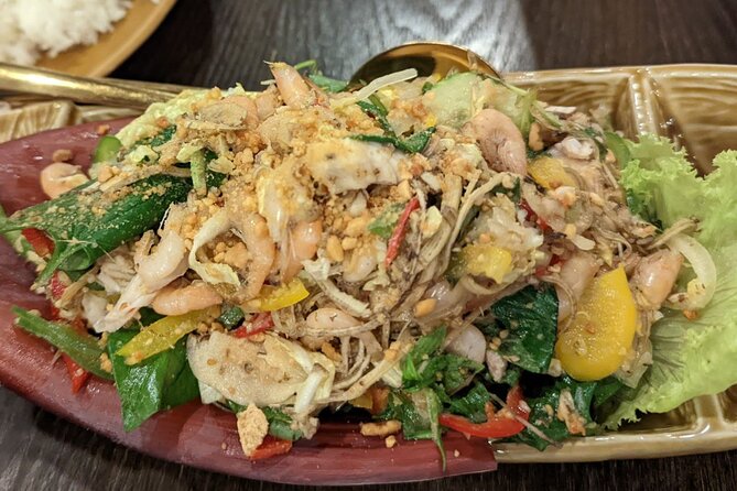 Phnom Penh Authentic Evening Food Tour 100% By Local - Samdach Pan Avenue adds curry and banana flower salad