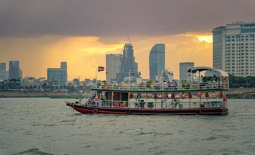 Phnom Penh: Bike & Boat Tour / E-Bike Available - Riding toward the Mekong and Tonle Sap