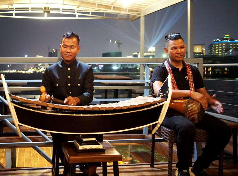 Phnom Penh: Mekong Sunset Dinner Cruise with Live Music - Weather, comfort, and small limitations