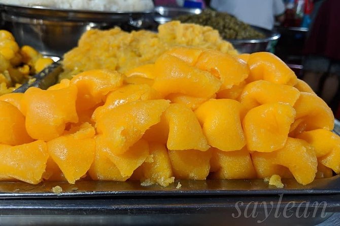Phnom Penh Nightlife Street Food Tours - Food choices, from fruit drinks to insects