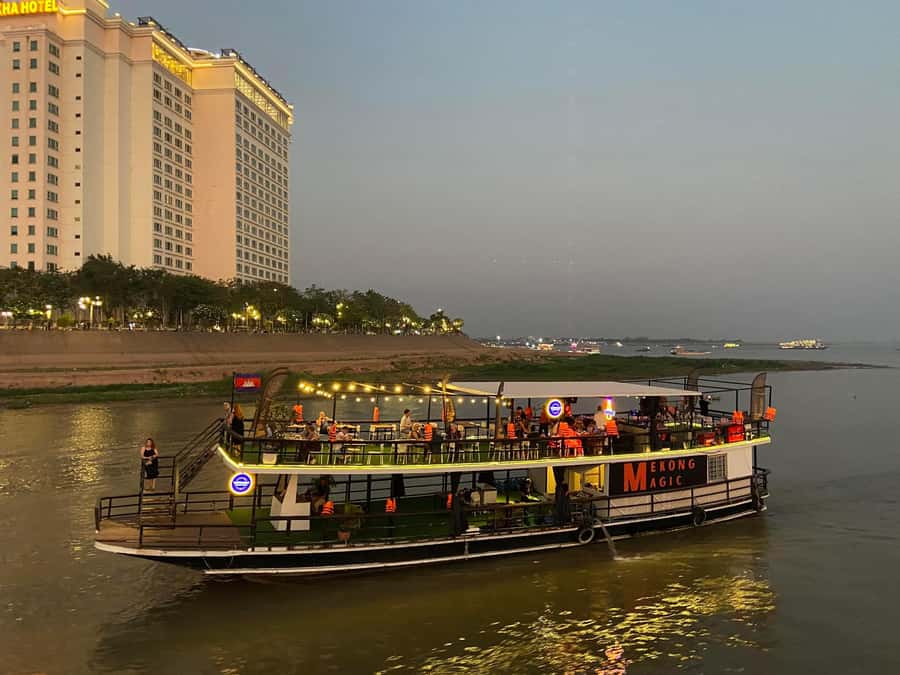 Phnom Penh: Sunset Cruise with Unlimited Beers & BBQ Buffet - A Phnom Penh sunset that starts with a tuk-tuk