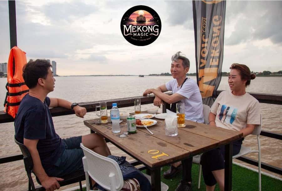Phnom Penh: Sunset Cruise with Unlimited Beers & BBQ Buffet - The sunset over the Tonle Sap meeting point