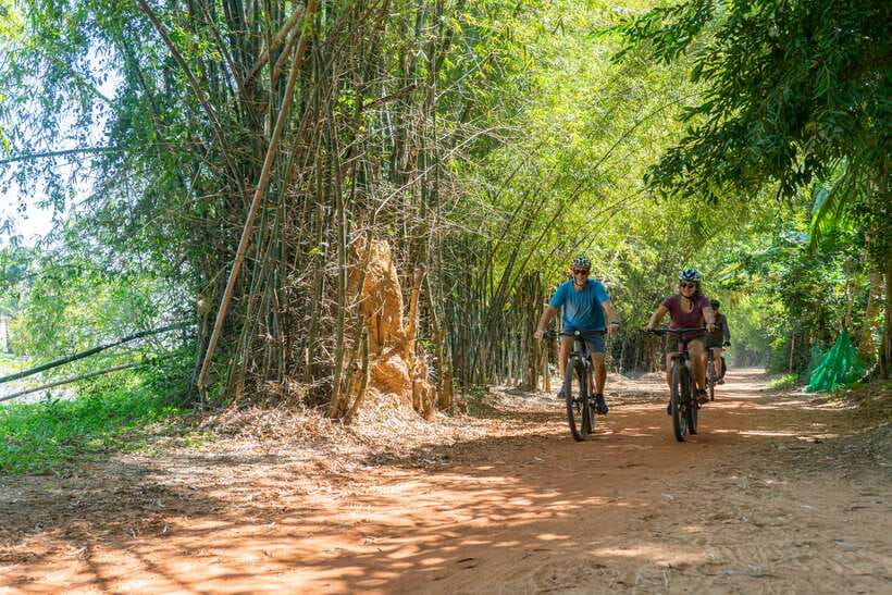 Siem Reap: Angkor Sunrise 2 Days Guided Bike Tour - Angkor Thom and Bayon bring the big monuments