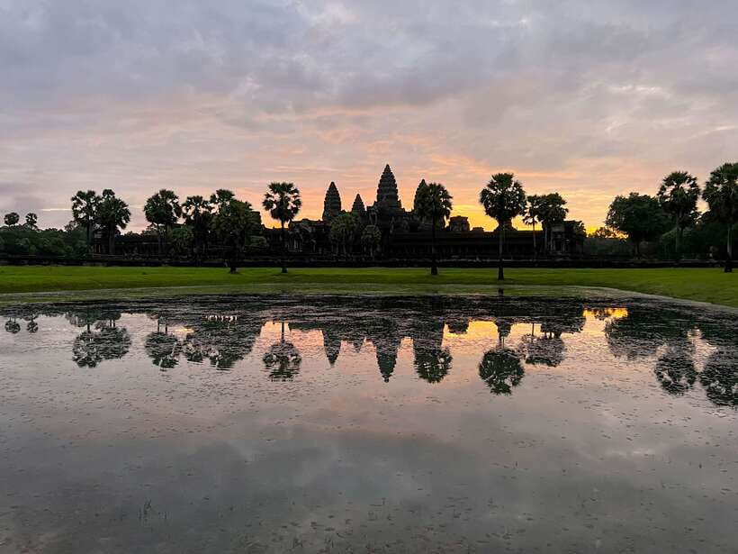 Siem Reap: Angkor Wat Sunrise and Market Tour by Jeep - Ta Prohm and Ta Nei Under the Jungle Growth