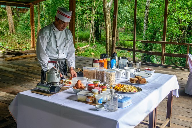 Siem Reap: Angkor Wat Sunrise Bike Tour & Jungle Breakfast - Bayon and the faces of Angkor Thom