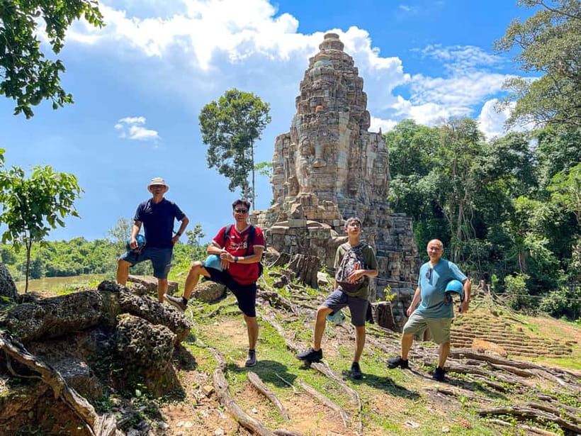 Siem Reap: Angkor Wat Sunrise Small Group tour and Breakfast - Angkor Thom and the smiling faces of Bayon