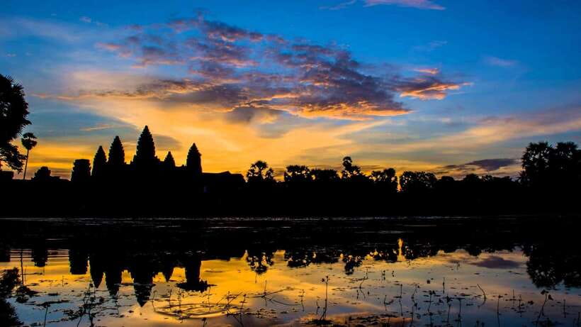 Siem Reap: Angkor Wat Temples & Phnom Kulen Park 3-Day Tour - Day two: Angkor Thom, Bayon, Ta Prohm, and sunset