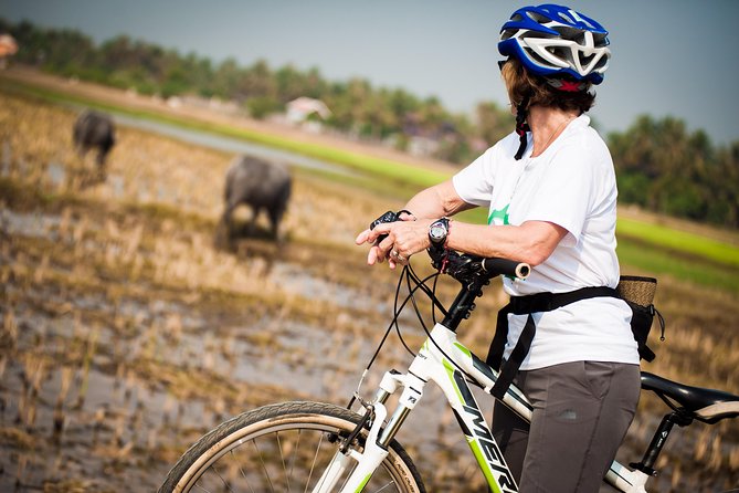 Siem Reap Countryside Guided Tour by Bike and E-Bike Private Tour - Village homes, snacks, and ordinary Cambodian life