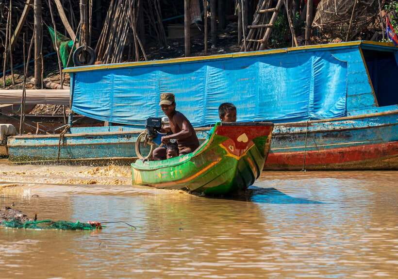 Siem Reap Floating Village Kampong Phluk Sunset with Boat - Walking through Kampong Phluk’s raised homes