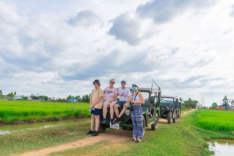 Siem Reap Floating Village Sunset Jeep Tour or SUV Car - Meeting a family beside the paddies
