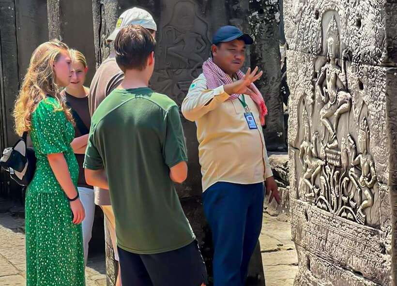 Siem Reap: Full-Day Angkor Wat Guided Tour with Sunset - The gates and faces of Angkor Thom