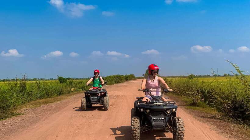 Siem Reap: Khmer Village and Fish Farm ATV Tour - Crossing rice fields and farm roads