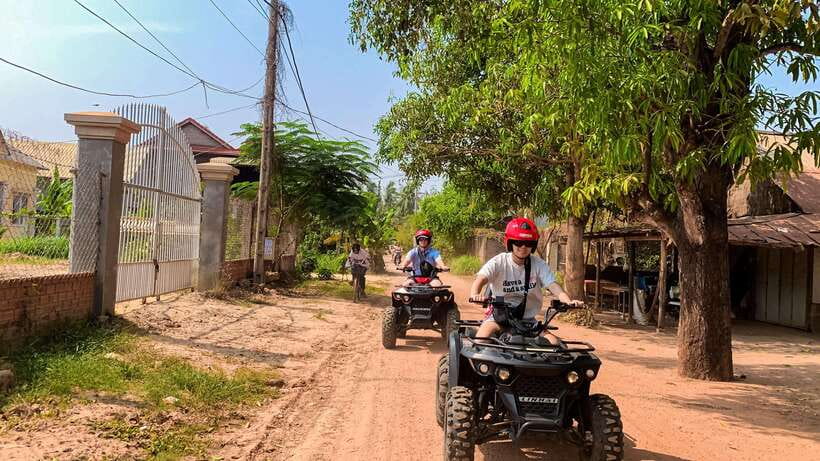 Siem Reap: Khmer Village and Fish Farm ATV Tour - Riding to colorful Buddhist temples