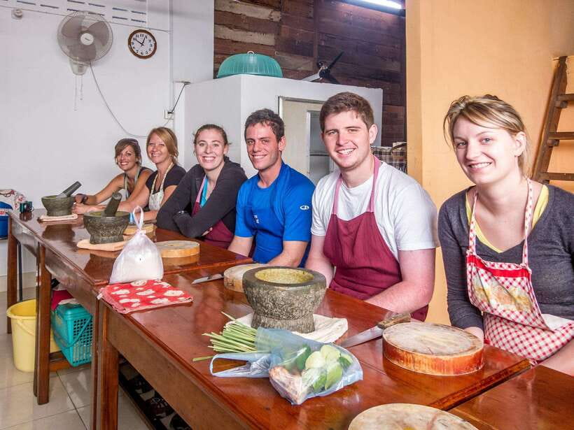 Siem Reap: Morning Cooking Class & Market Tour - A village kitchen surrounded by plants and rice fields