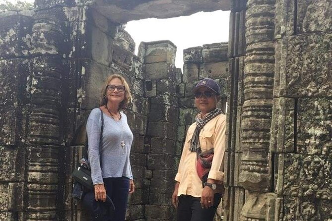 Siem Reap Private Day Tour: Angkor Wat Sunrise, Bayon & Ta Prohm - Ta Prohm, where trees share the ruins