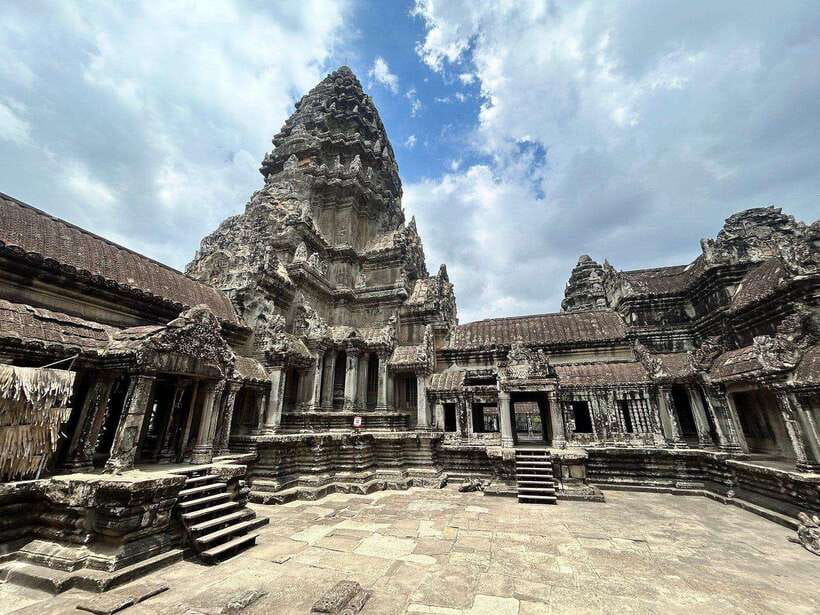 Small-Group Full Day Angkor wat Guide tour with Sun set - Angkor Thom and Bayon: entering through gods and demons