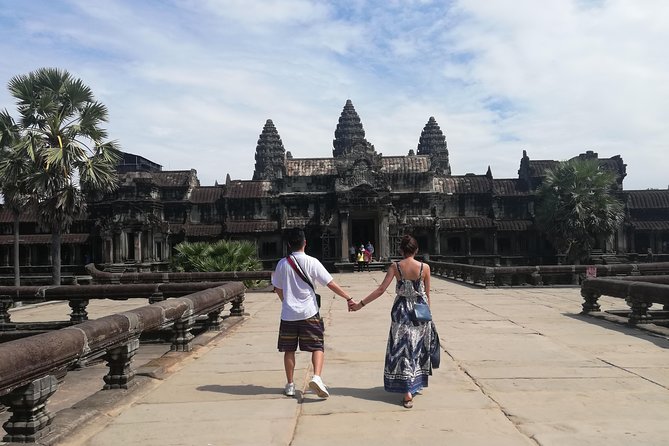 Sunrise Small Group Tour to Angkor Wat Temple - Ta Prohm, where trees take over the temple