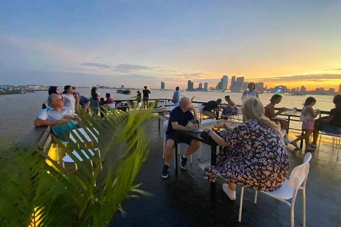 Sunset Cruise with free flow beer, soft drinks & fruit platter - Passing Phnom Penh’s older hotels and new districts