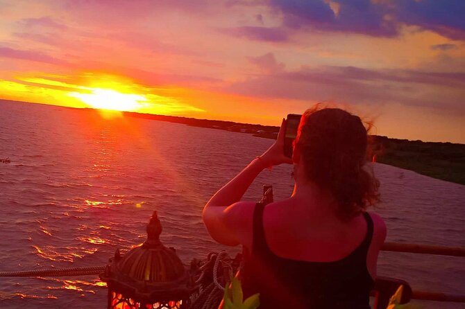 Sunset Dinner and drinks includes a Floating Village cruise tour. - Boarding the Queen Tara for dinner